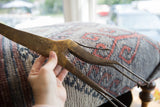 Aged bronze patina and detailed hand-etched patterns on the vintage giraffe sculpture.