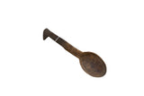 Vintage handmade African wooden spoon with a dark, aged patina and deeply carved bowl.