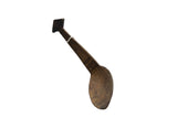 Vintage African wooden spoon with a rich, dark grain and a carved geometric handle.