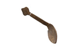 Vintage hand-carved African wooden spoon with a dark, rustic patina and a distinctive handle.