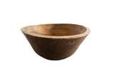 Vintage African wooden bowl with a rustic, hand-carved texture and warm brown patina.