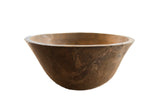 Vintage African wooden bowl with a rustic, hand-carved texture and naturally aged patina.