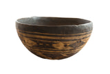 Vintage African wooden bowl with dark patina, hand-carved geometric patterns, 12 inches.