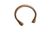 Antique African snake cuff bracelet with a hand-forged form and warm bronze patina.