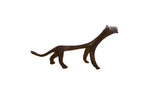 Vintage African cheetah sculpture with a stylized elongated form and a dark, textured patina.