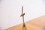 Handmade texture on the back of a vintage gazelle's neck and slender horns.