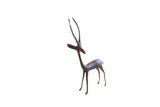 Vintage left-facing African gazelle sculpture with a dark patina and long, slender horns.