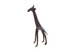 Vintage handmade African giraffe sculpture with a dark, textured patina.