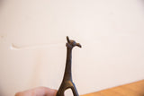 Vintage African giraffe sculpture head and neck with dark patina and hand-carved details.