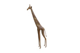 Tall and slender vintage African giraffe collectible with a weathered brown patina.