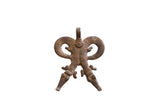 Vintage African double crocodile pendant with a detailed, etched texture and aged bronze patina.