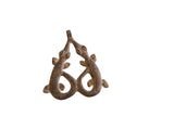 Vintage African double crocodile pendant with etched details and a dark bronze patina.