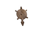 Vintage African turtle pendant featuring an incised concentric circle shell and dark patina.