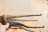 Hand-finished texture and slender form of the vintage African giraffe's metal legs.