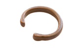 Antique African copper alloy snake cuff bracelet with a smooth, aged patina.