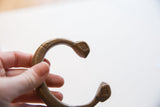 Detail of the etched geometric patterns on the antique African bronze snake cuff.
