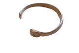 Antique African bronze snake cuff bracelet with a smooth surface and aged patina.