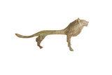 Vintage African lion collectible statuette with a slender form and oxidized green patina.