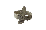 Vintage African snake cuff arm bracelet with a textured, weathered metal finish and incised patterns.