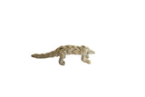 Vintage African pangolin sculpture with textured, overlapping scales and a weathered patina.