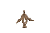 Vintage African pendant with a two-headed animal motif and a dark, textured patina.