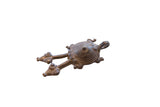 Vintage African pendant of a stylized bronze turtle with concentric rings and dual heads.