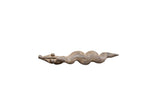 Vintage African pendant hand-carved with a serpentine body and a dark, weathered finish.