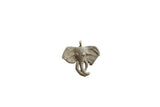 Vintage African bronze elephant head pendant with a rustic, weathered patina.