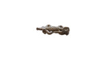 A collectible vintage African bronze crocodile pendant with an incised, textured body.