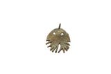 Vintage African bronze jellyfish pendant with a textured, weathered patina and two eye cutouts.