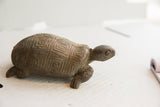 Vintage African tortoise sculpture with a hand-carved geometric shell and aged patina.