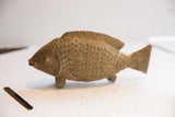 Close-up of the vintage African fish sculpture showing textured scales and fin detail.