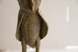 Handmade texture and aged patina on the chest of the vintage owl sculpture.