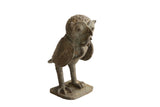 Vintage African owl with snake sculpture featuring a dark, weathered patina and textured details.