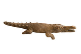 Vintage African crocodile sculpture with hand-carved textured scales and an aged brown patina.