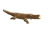 Vintage handmade African crocodile sculpture with textured earthy brown finish.