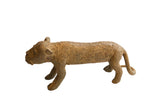 Vintage African cheetah sculpture with a stylized form and a textured circular pattern.