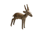 Vintage handmade African antelope sculpture with a rustic, textured brown surface.