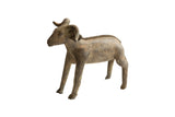 Vintage African ram sculpture shown in profile with a rustic, dark aged patina.