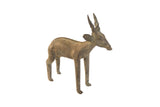 Vintage handmade African antelope sculpture with a weathered bronze-colored patina and textured details.
