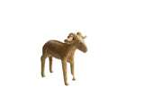 Vintage handmade African ram sculpture with a rustic texture and imperfect form.