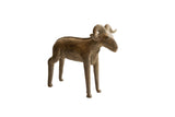 Vintage handmade African ram sculpture with a rustic, earthy finish and curled horns.