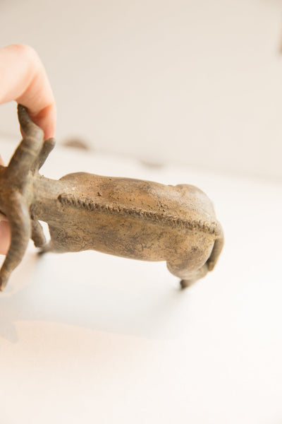 Detail of the vintage ram sculpture's textured back and raised stitched spine.