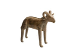 Vintage African ram sculpture with a textured brown patina and curled horns.