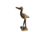 Vintage African bird with fish sculpture showing rustic handmade details and a dark, aged patina.