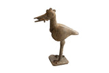 Vintage African bird and fish sculpture with a dark, weathered patina and incised textural details.