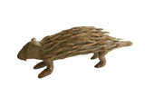 Vintage African porcupine sculpture with textured quills and an aged bronze patina.