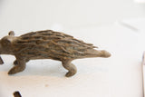 Detail of the porcupine sculpture's aged patina and textured, hand-sculpted quills.