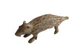 Vintage African porcupine sculpture with a rustic, handmade texture and aged bronze patina.