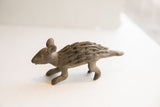 Handmade texture of the vintage African porcupine sculpture's spiny back.